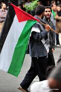 العلم الفلسطيني أثناء فعالية يوم القدس في طهران.