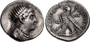 Coin with Ptolemy VIII likeness on the obverse and the statue of an eagle on the reverse