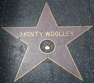 Monty Woolley's star, showing a "TV" emblem, even though his category is "Motion Pictures"
