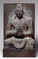 Seated Maitreya, 7th-8th century AD, near Kabul, Afghanistan. "Stylistically related to Shahi sculpture of northern Pakistan and Afghanistan".[116]