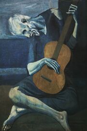 اللون الأزرق يعبر عن الكآبة في لوحة عازف الجيتار العجوز لبيكاسو (1903-1904).