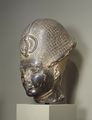 تمثال أمنحوتپ الثالث (أعيد نحته على أنه رمسيس الثاني) يرتدي تاج خپرش.متحف والترز للفنون، بالتيمور.