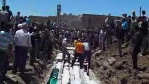 Houla Massacre Victims Burial.jpg