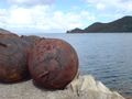 Old iron buoys, most likely for mooring.