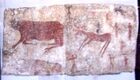 The first documented use of cinnabar or vermilion pigment was found at the neolithic village of Çatalhöyük in modern-day Turkey. This mural, from 7000 to 8000 BC, shows aurochs, a deer, and humans. (Museum of Anatolian Civilizations, Ankara)