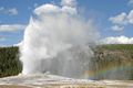 Old Faithful geyser erupts in Yellowstone National Park in Wyoming