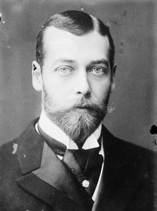 Pale-eyed young man with a beard and moustache