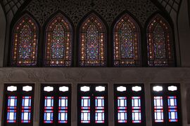Iranian stained glass designs inside the Tabātabāei House.