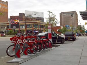 Row of red rental bicycles