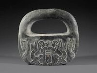 Chlorite, Jiroft culture Iran, ca. 2500 BC, Bronze Age I a cloven-footed human flanked by scorpions and lionesses