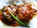 A traditional Bengali fish meal – Rice with Macher Jhol (Literally translated to "Fish's gravy")