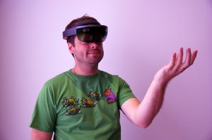 Photograph of a man wearing an augmented reality headset