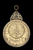 photograph of an astrolabe with a geared calendar