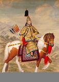 The Qianlong Emperor in ceremonial armour decorated with numerous images of dragons, Qing dynasty