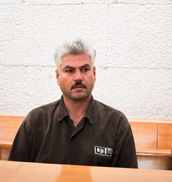 عباس السيد من داخل قاعة المحكمة عام 2010.png