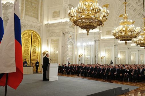 Russian President Vladimir Putin addresses the Federal Assembly of the Russian Federation, the Government, governors and others in a speech regarding Crimea's accession to Russia.