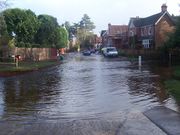 The ford at Brockenhurst, leading into the village centre, following heavy rain.