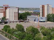 Kokshetau showing the view of Independence Square in 2021, with Independence Monument on the right and Dostyk Hotel on the left background.