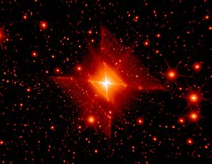 A brilliant red square-shaped planetary nebula