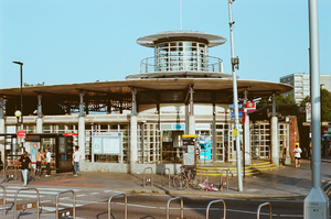 Woolwich Arsenal station, National Rail entrance This station opened in 1849, serving the North Kent Line from London to Gillingham. The station building was rebuilt in 1906 with a London brick-built structure, very typical of southeast London. The current station building dates from 1996, and has a modern design in steel and glass.