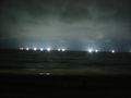 The lights from squid fishing boats, seen from Hakodate.