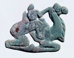 Nomadic figure, typically with a long nose, on a Bactrian camel. Southern Ningxia, 4th century BC.[25][24]