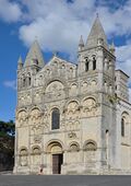 The facade of Angoulême Cathedral was built between 1110 and 1128 in the Romanesque style.
