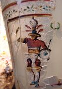 Glass with painting of a Roman gladiator.