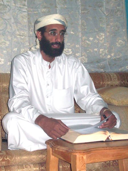 ملف:Anwar al-Awlaki sitting on couch, lightened.jpg