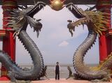Giant dragon statues surrounded by the sea at Sanggar Agung Temple, Surabaya, Indonesia