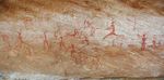 مشهد صيد مرسوم على صخرة في أحد كهوف جبل أكاكوس في ليبيا يعود تاريخه إلى العصر الحجري الحديث