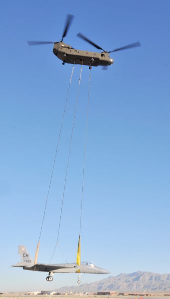 ملف:Chinook airlifting an F-15 (2).jpg