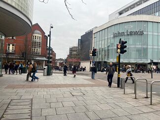 John Lewis Building, adjacent to Waterstones in the busy high street.