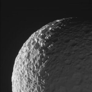 A high-relief image of Mimas by Cassini on January 30, 2017. [42] The shapes and the texture of its many overlapping craters can clearly be seen.