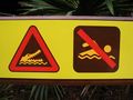 A pictograph warning against swimming because of crocodiles at the Australia Zoo.