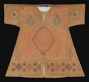 Talismanic shirt inscribed with Quranic verses, the Asma’ al-Husna, and prayers along with depictions of the two holy sanctuaries. Turkey, 18th century