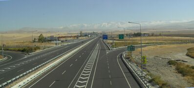Turkish state road D 750 at Konya junction. Toros Mountains in the background