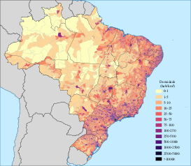 A map of Brazil, with purple circles denoting areas of high population in the year 2022. A large majority of the circles line Brazil's eastern coast.