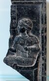 Fragmentary Neo-Sumerian steatite relief showing Ninsun