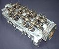 A single overhead camshaft (SOHC) cylinder head من هوندا D15A3.