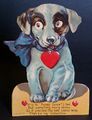 إحدى بطاقات عيد الحب مثبت في مركزها حلقة يمكن عن طريقها التحكم في خروج الوميض من عيني الكلب لينتقل من إحدى العينين إلى الأخرى بينما يتحرك القوس الأزرق الذي يحيط برأس الكلب