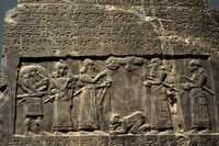 The Assyrian king Shalmaneser III receives tribute from Sua, king of Gilzanu, The Black Obelisk.
