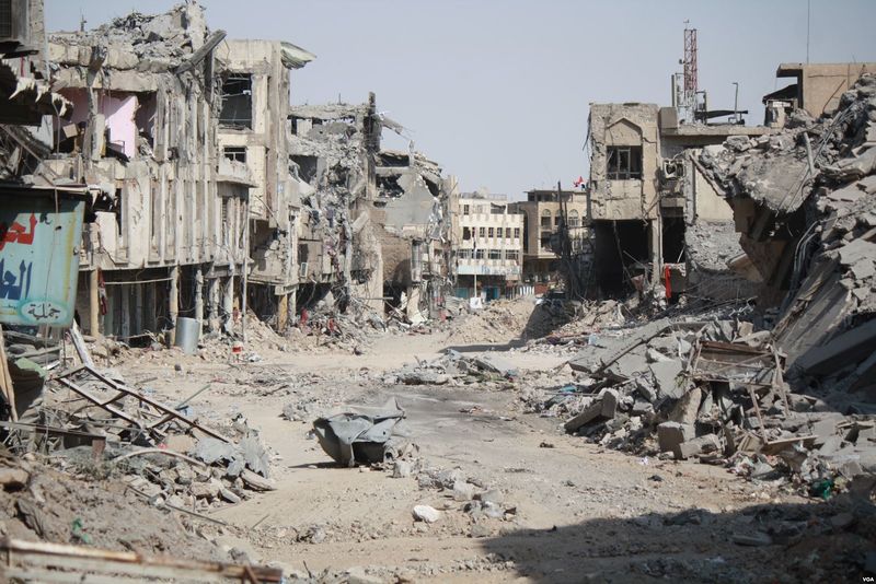 ملف:Mosul in ruins after war.jpg