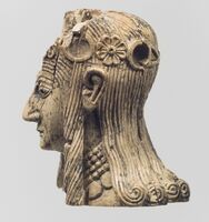 Female head, probably from a statuette, North Syrian style