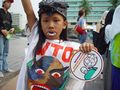 Some people do not see international trade favourably: here a person protests against the WTO in Jakarta.