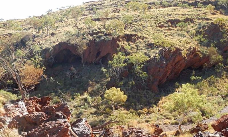ملف:Mining giant Rio Tinto has admitted damaging ancient Aboriginal rock shelters, dubbed Juukan 1 and Juukan 2, in the remote Pilbara region to expand its iron ore mine. PKKP Aboriginal Corporation-AFP-Getty Images.jpg