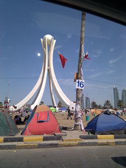 Protesters camped out infront of the Pearl Roundabout days before it was torn down